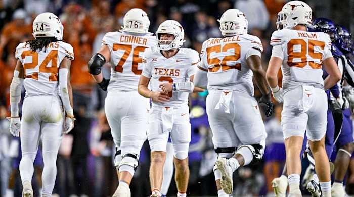 Quinn Ewers celebrates with Texas.